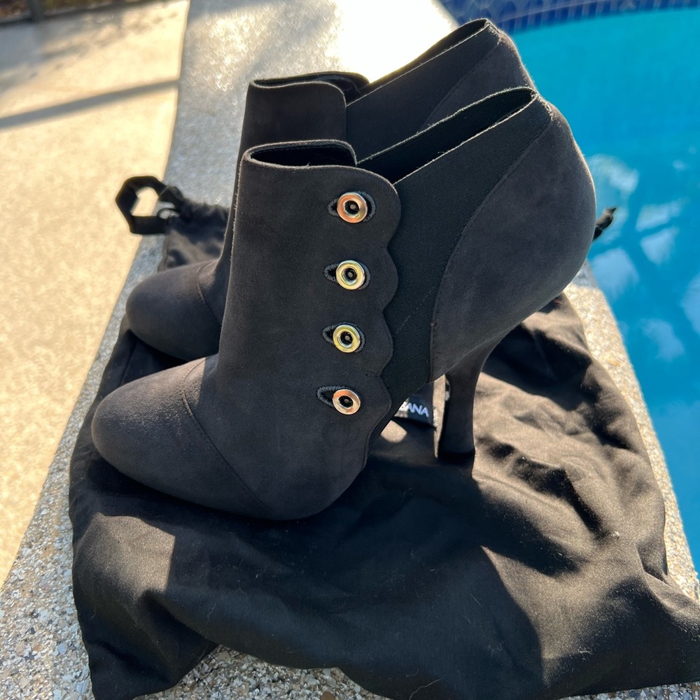 Dolce & Gabbana Black Heeled Boots with Gold Accents